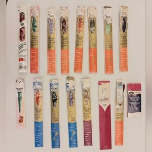 15 vintage metal colored zippers.